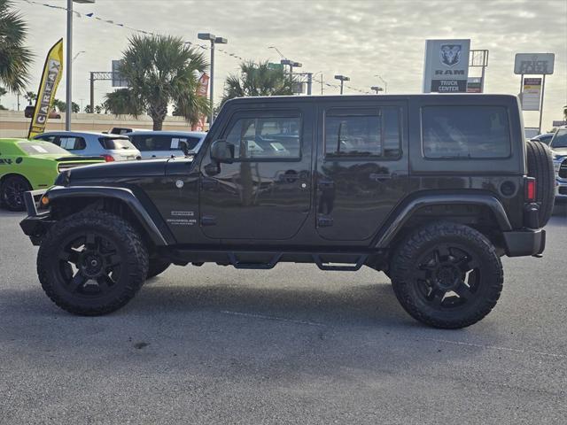 used 2016 Jeep Wrangler Unlimited car, priced at $21,544