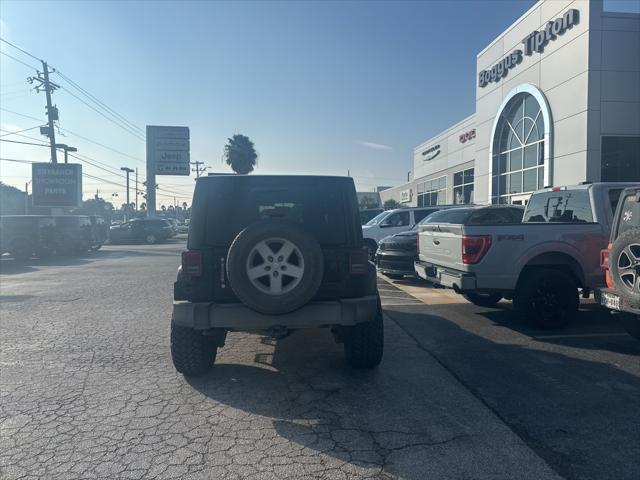 used 2016 Jeep Wrangler Unlimited car, priced at $21,544