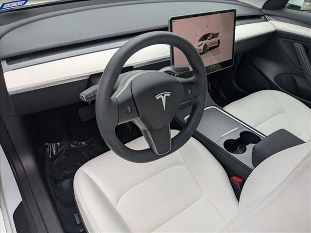 used 2023 Tesla Model 3 car, priced at $25,990