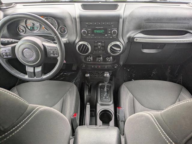 used 2015 Jeep Wrangler Unlimited car, priced at $21,999