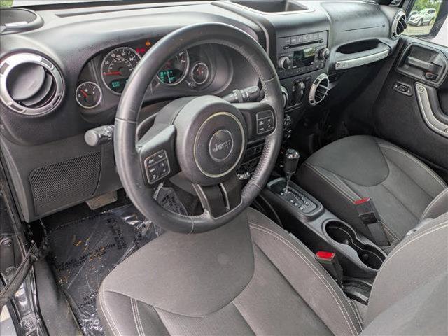 used 2015 Jeep Wrangler Unlimited car, priced at $21,999