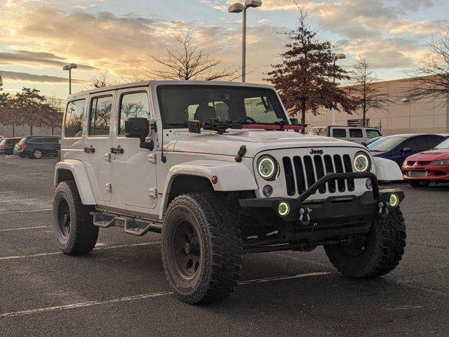 used 2015 Jeep Wrangler Unlimited car, priced at $21,991