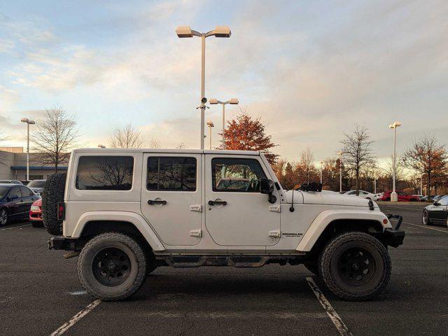 used 2015 Jeep Wrangler Unlimited car, priced at $21,991