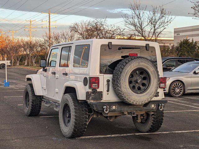 used 2015 Jeep Wrangler Unlimited car, priced at $21,991