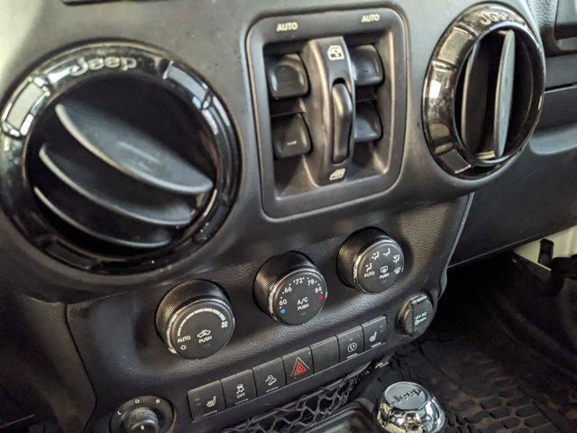 used 2015 Jeep Wrangler Unlimited car, priced at $21,991