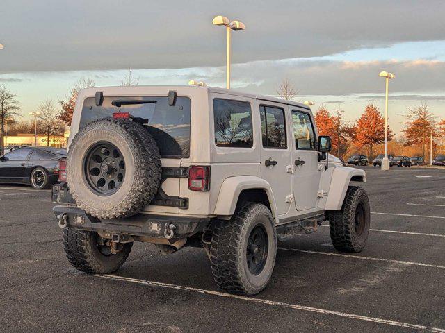 used 2015 Jeep Wrangler Unlimited car, priced at $21,991