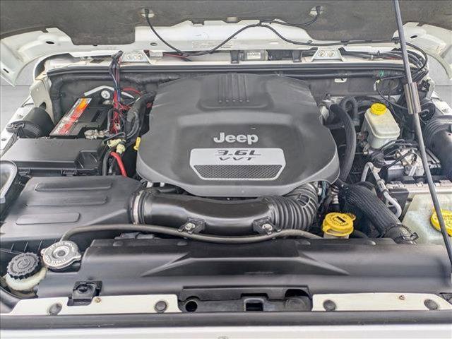 used 2013 Jeep Wrangler Unlimited car, priced at $11,000