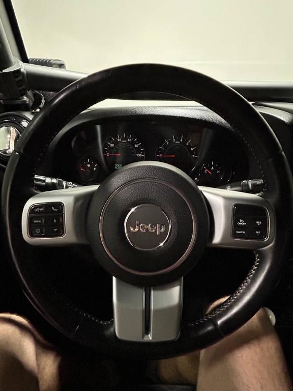 used 2013 Jeep Wrangler Unlimited car, priced at $16,999