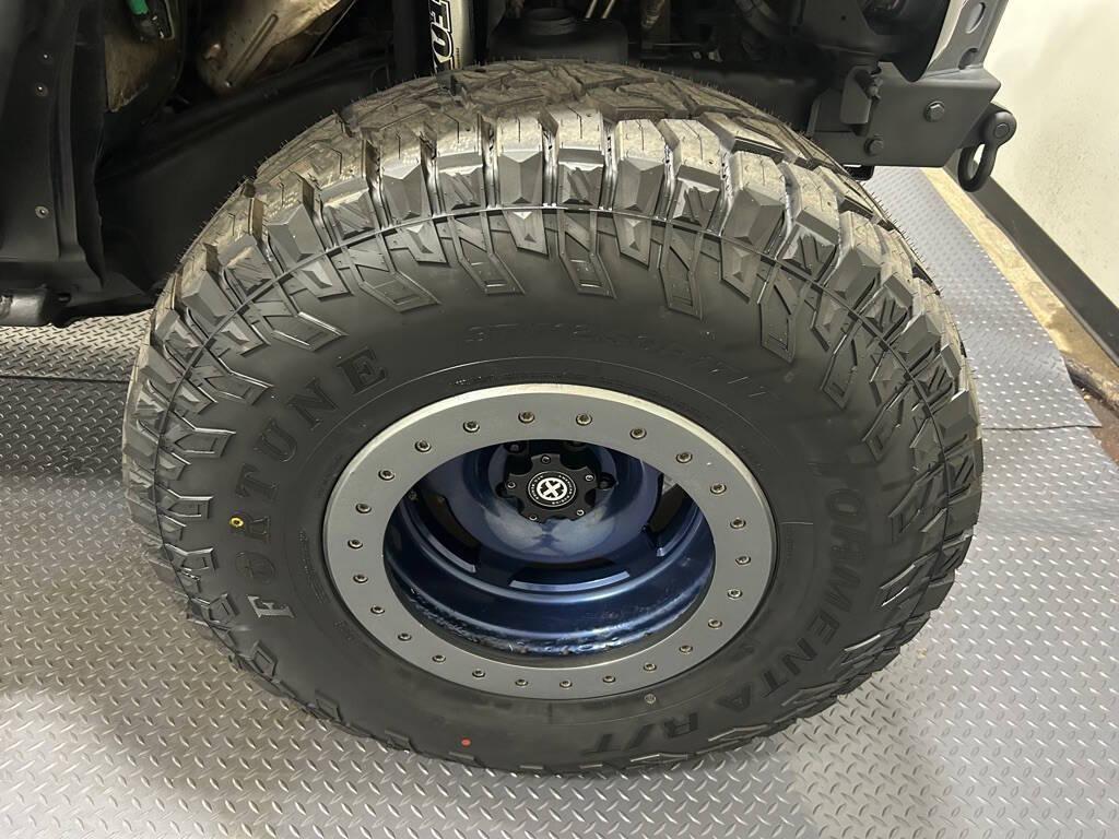 used 2013 Jeep Wrangler Unlimited car, priced at $16,999