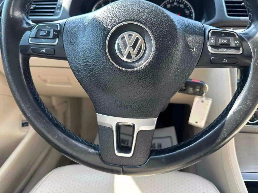 used 2014 Volkswagen Passat car, priced at $8,991
