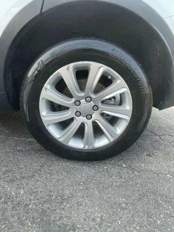 used 2016 Land Rover Discovery Sport car, priced at $12,991