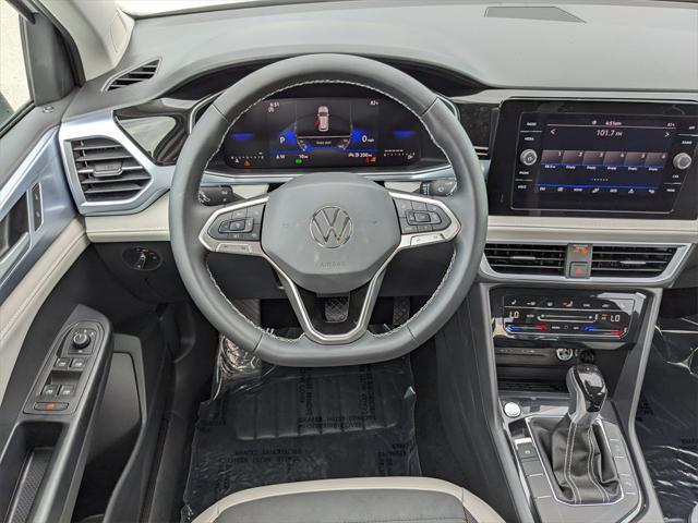 new 2025 Volkswagen Taos car, priced at $29,291