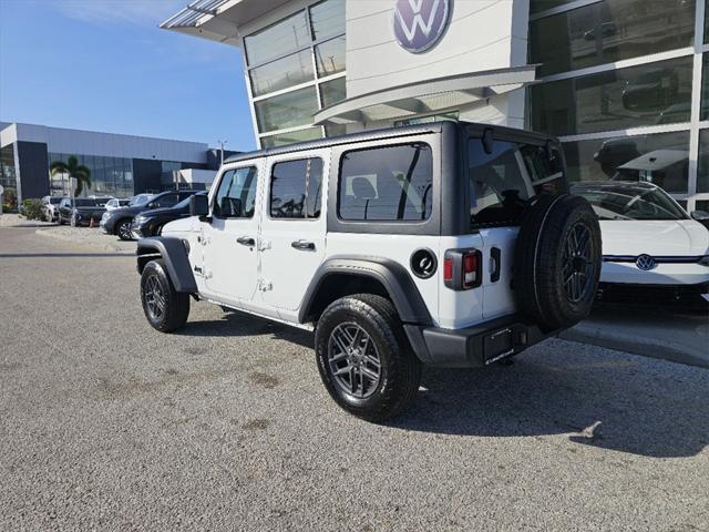 used 2024 Jeep Wrangler car, priced at $34,307