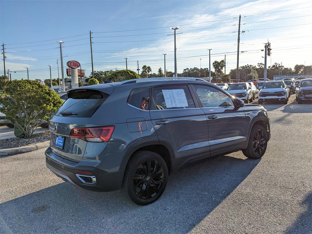 used 2023 Volkswagen Taos car, priced at $18,044