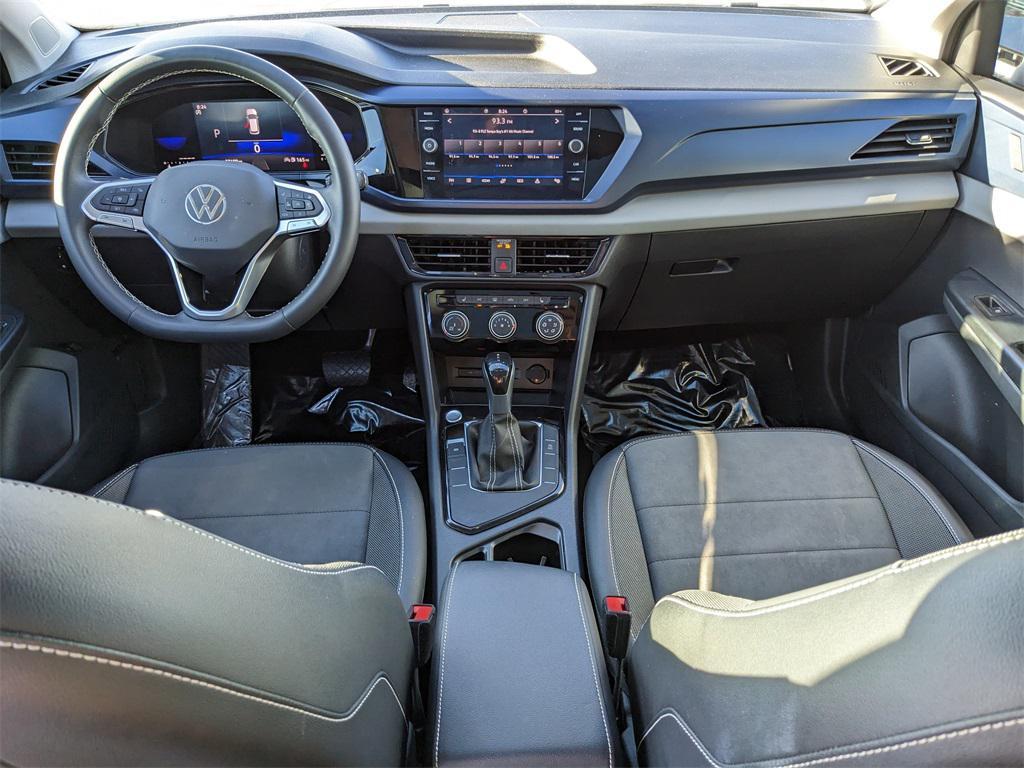 used 2023 Volkswagen Taos car, priced at $18,044