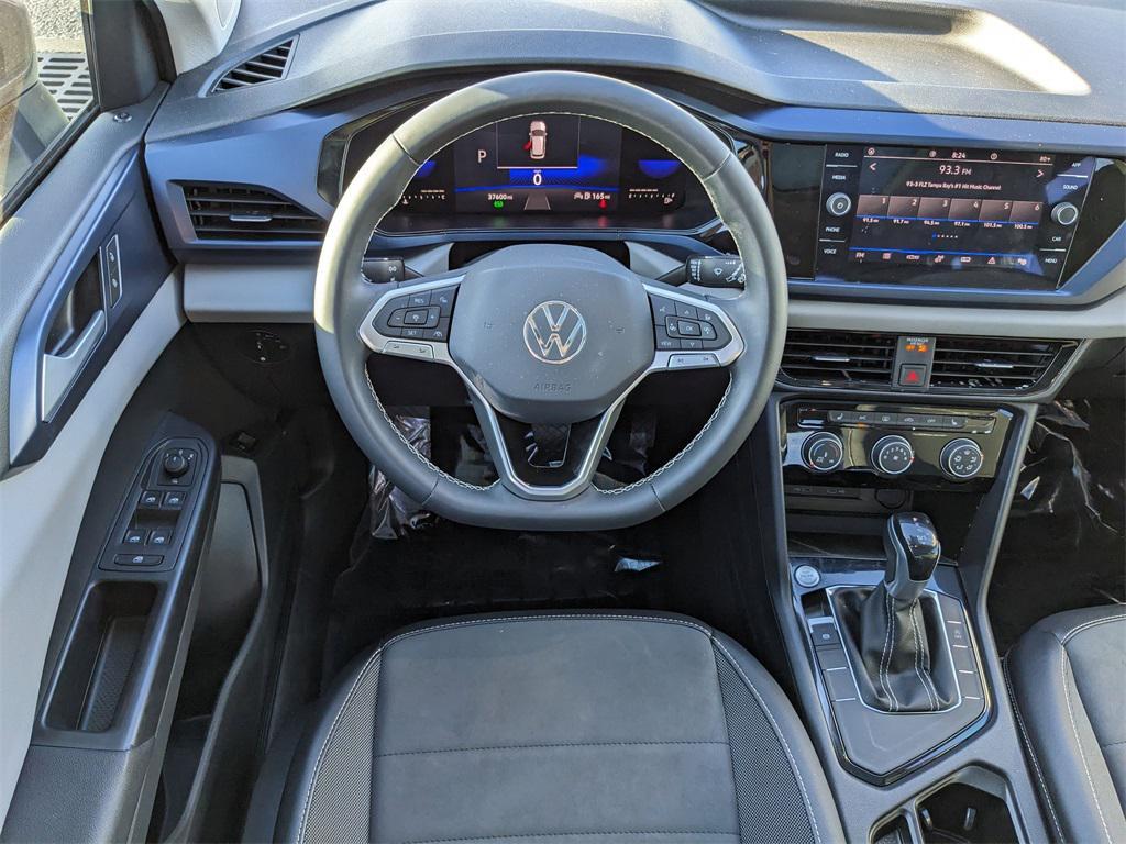 used 2023 Volkswagen Taos car, priced at $18,044