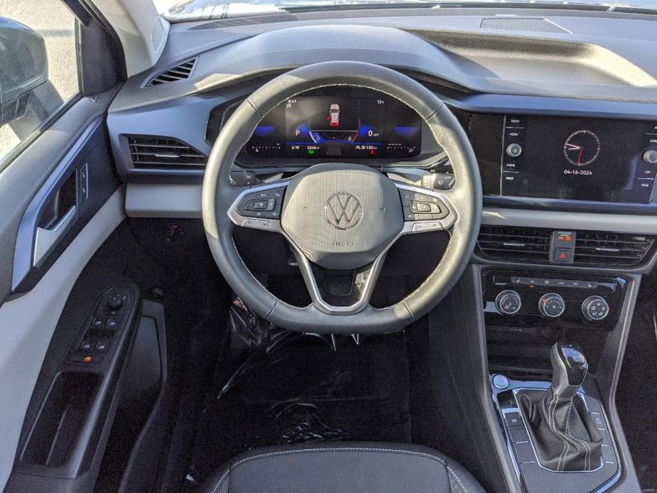 used 2023 Volkswagen Taos car, priced at $24,218