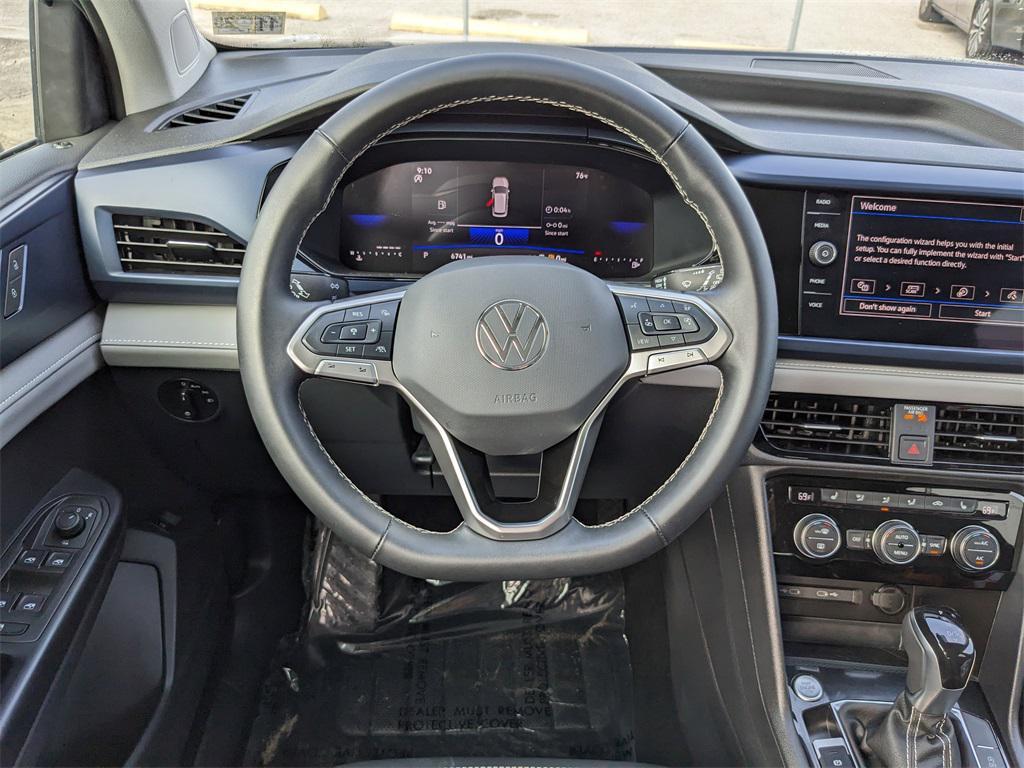 used 2024 Volkswagen Taos car, priced at $20,143