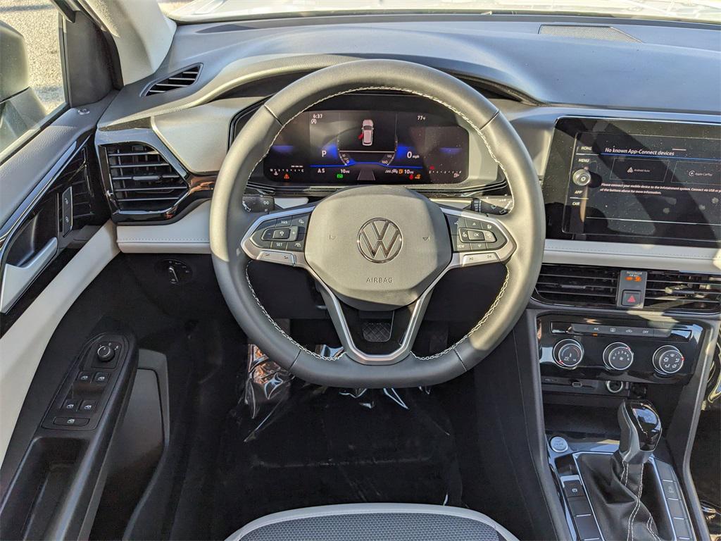 new 2025 Volkswagen Taos car, priced at $26,153