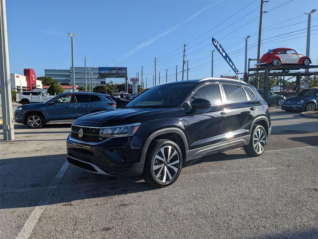 used 2024 Volkswagen Taos car, priced at $22,412