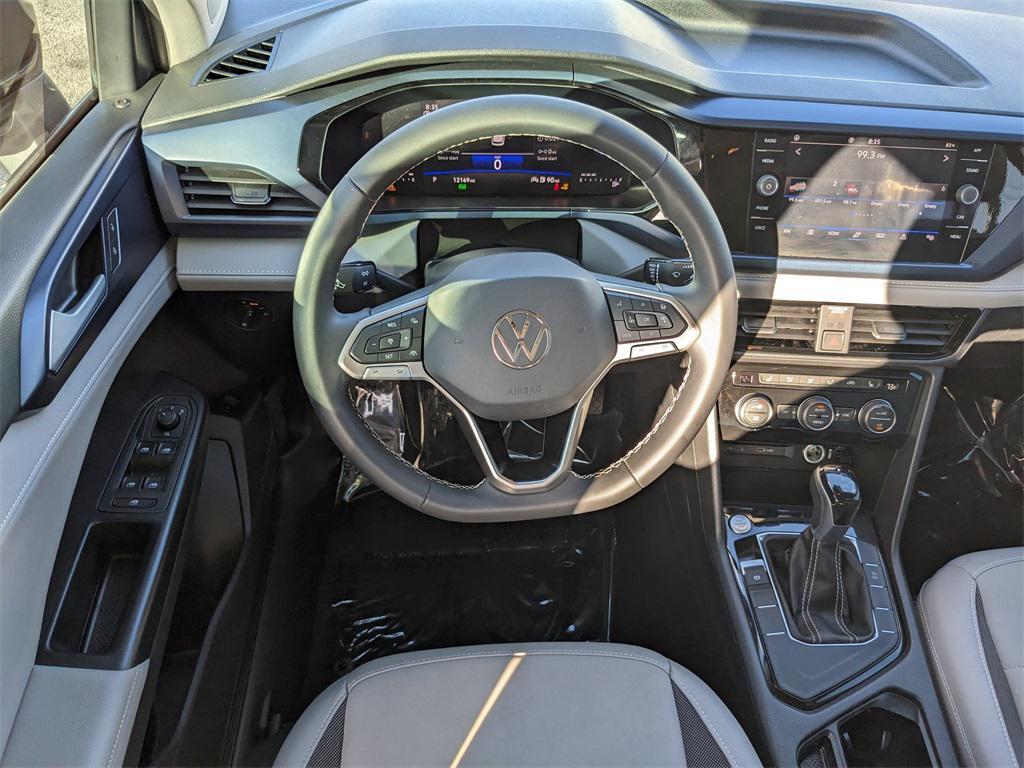 used 2024 Volkswagen Taos car, priced at $22,412