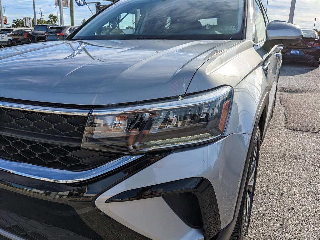 used 2022 Volkswagen Taos car, priced at $17,489