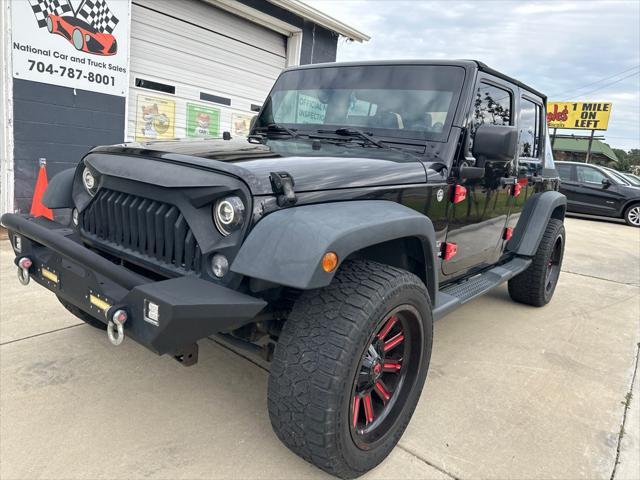 used 2014 Jeep Wrangler Unlimited car, priced at $12,248