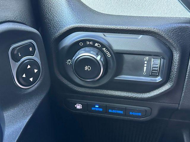 used 2024 Jeep Wrangler 4xe car, priced at $38,109