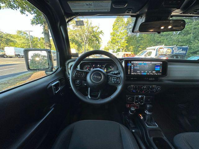 used 2024 Jeep Wrangler 4xe car, priced at $38,109