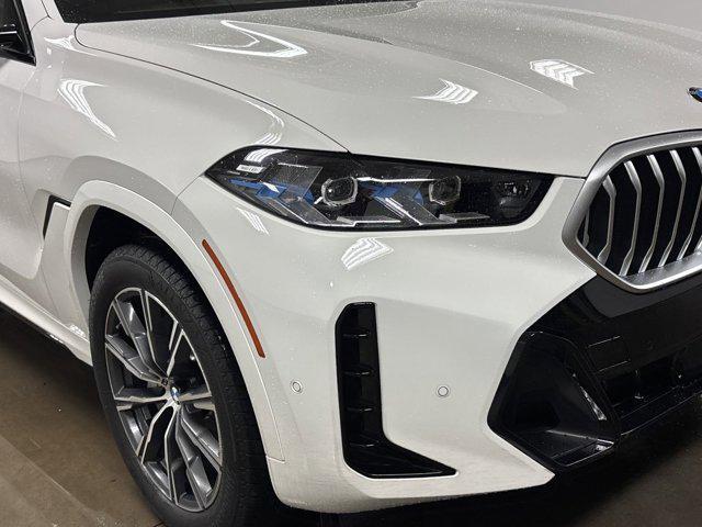 new 2025 BMW X6 car, priced at $82,975