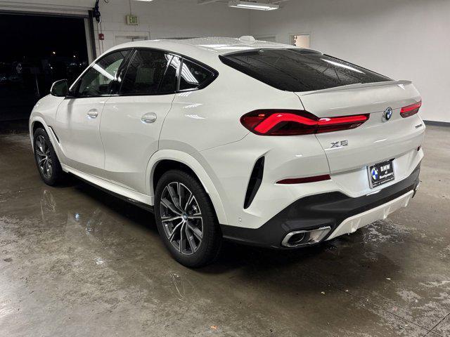 new 2025 BMW X6 car, priced at $82,975