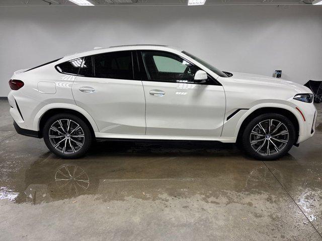 new 2025 BMW X6 car, priced at $82,975