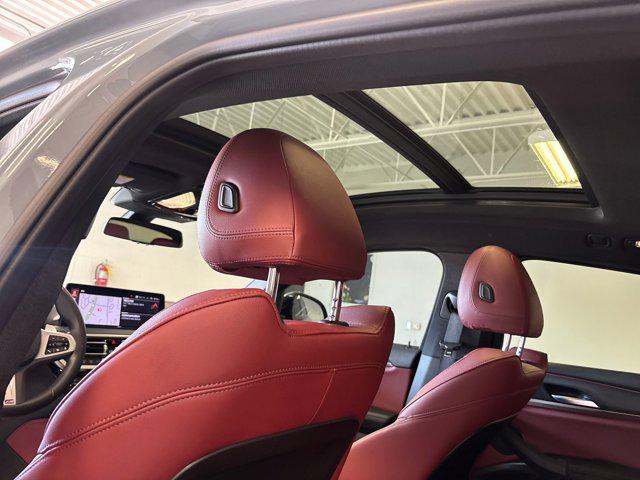 used 2022 BMW X4 car, priced at $39,999
