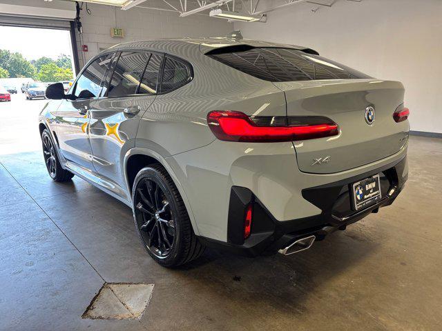 used 2022 BMW X4 car, priced at $39,999