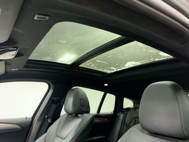 used 2025 BMW X4 car, priced at $50,999