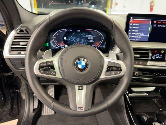 used 2025 BMW X4 car, priced at $50,999