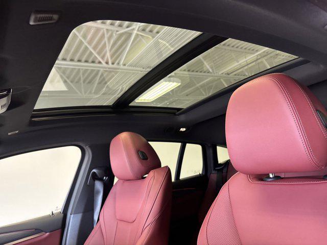 new 2025 BMW X4 car, priced at $60,080