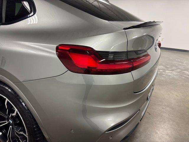 used 2021 BMW X4 M car, priced at $49,999