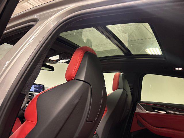 used 2021 BMW X4 M car, priced at $49,999