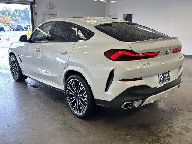 new 2025 BMW X6 car, priced at $88,835