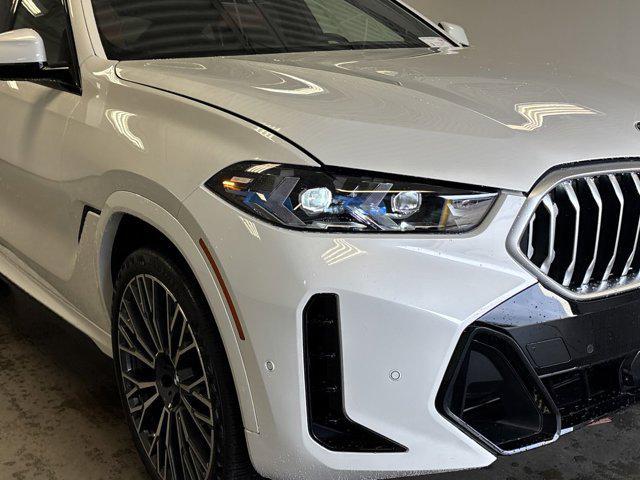 new 2025 BMW X6 car, priced at $88,835