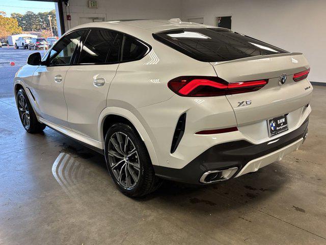 new 2025 BMW X6 car, priced at $77,875