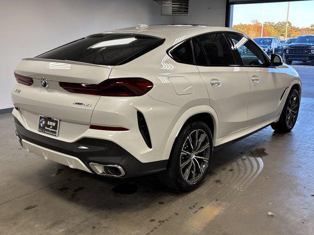 new 2025 BMW X6 car, priced at $77,875