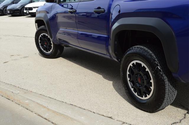 used 2024 Toyota Tacoma car, priced at $40,551
