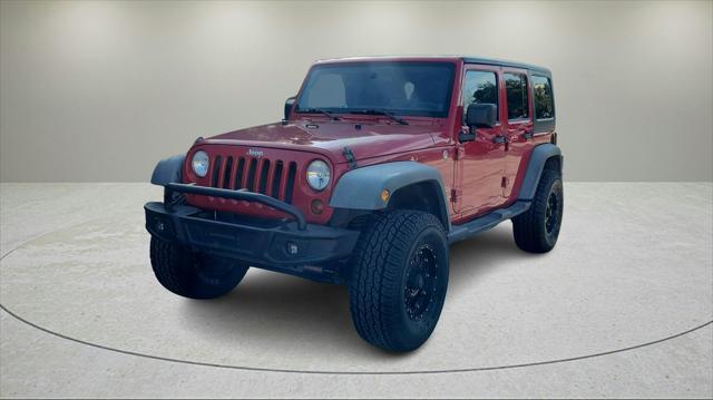 used 2011 Jeep Wrangler Unlimited car, priced at $12,258