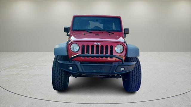 used 2011 Jeep Wrangler Unlimited car, priced at $12,258