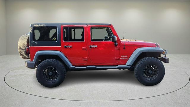 used 2011 Jeep Wrangler Unlimited car, priced at $12,258