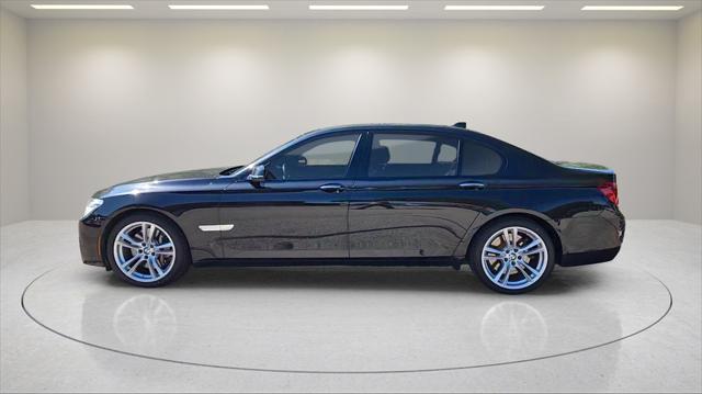 used 2015 BMW 750 car, priced at $16,995