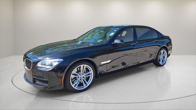 used 2015 BMW 750 car, priced at $16,995