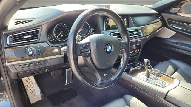 used 2015 BMW 750 car, priced at $16,995